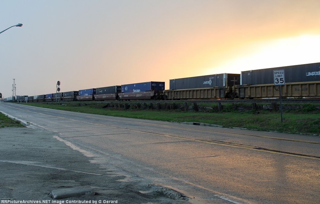 Q188 moving in heavy rain in the setting sun